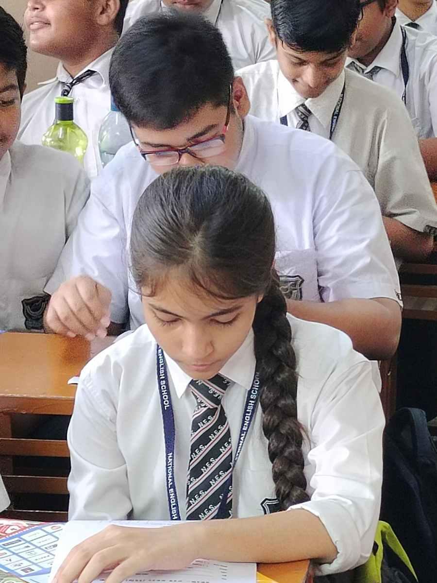 students reading question paper