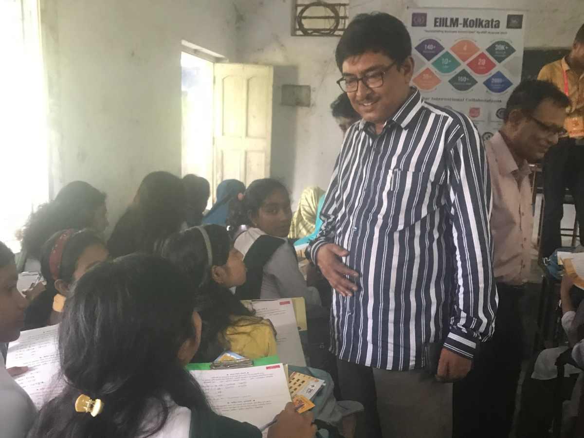 Teacher interacting with students